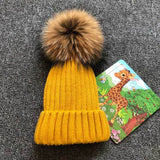 Female Fur Pom Poms hat